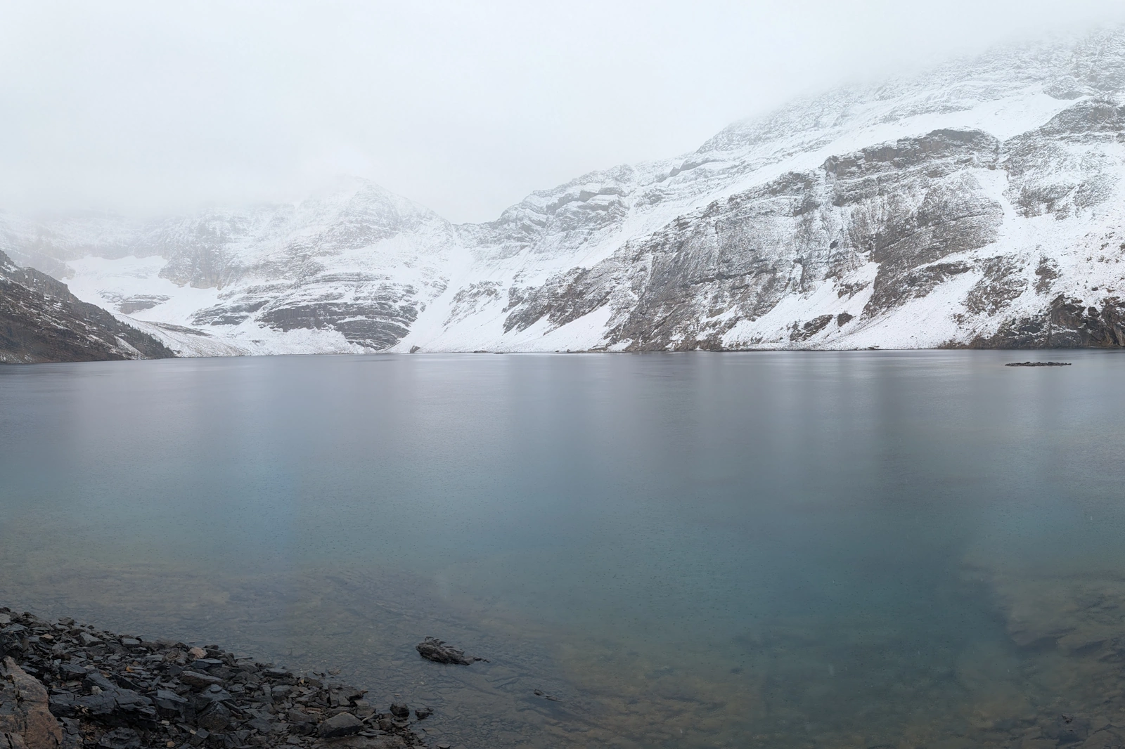 Sitting perched at 2,250 metres, Lake McArthur’s deep, cold waters rest beneath sheer limestone faces dusted with October’s first real accumulations.